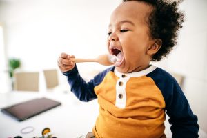 Toddler utensil use milestones