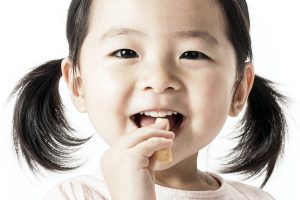 Healthy toddler snacking